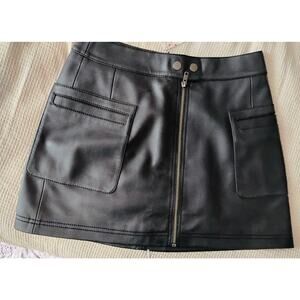 Size 4 Black Free People leather skirt with Pockets. New With Tags. Goth. Vamp